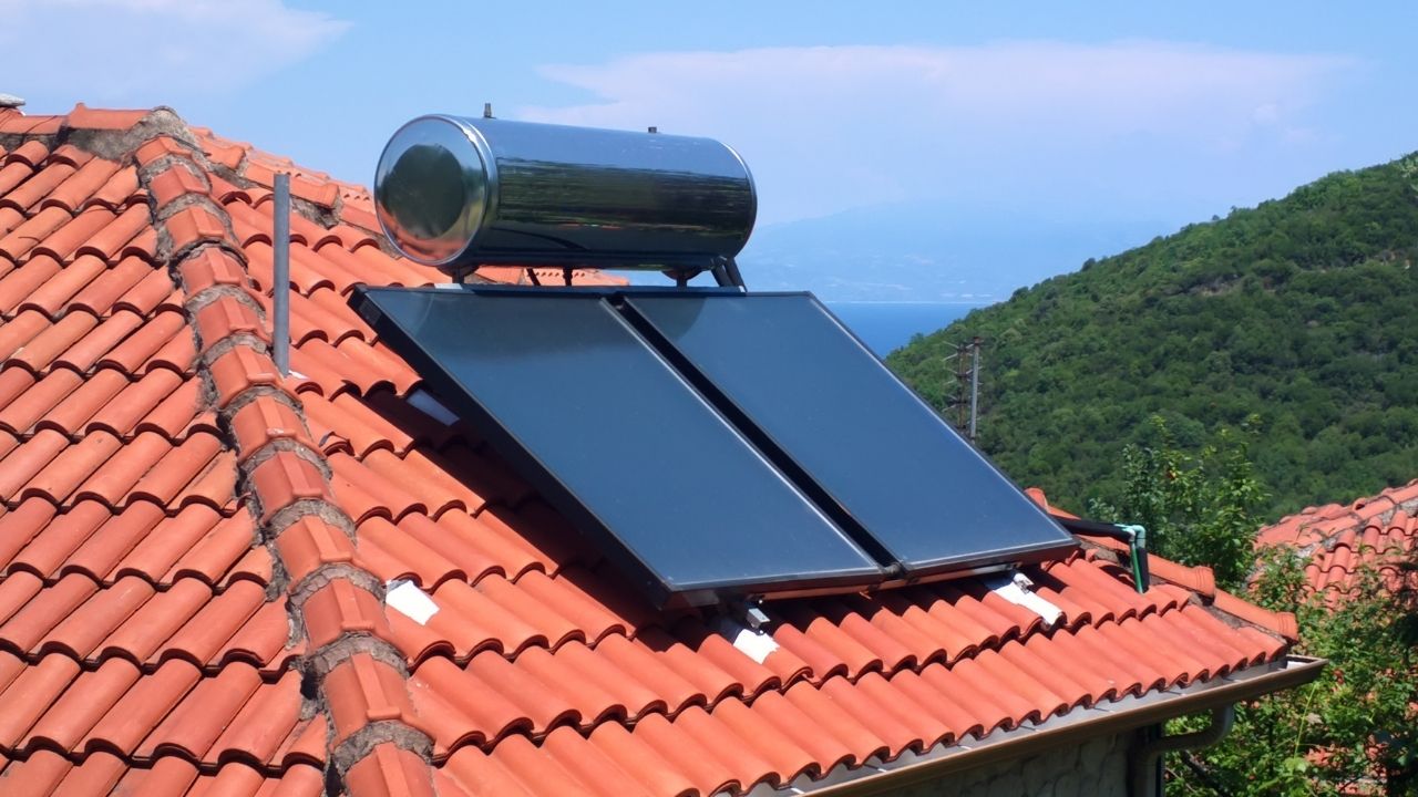 solar panels with water tank on roof